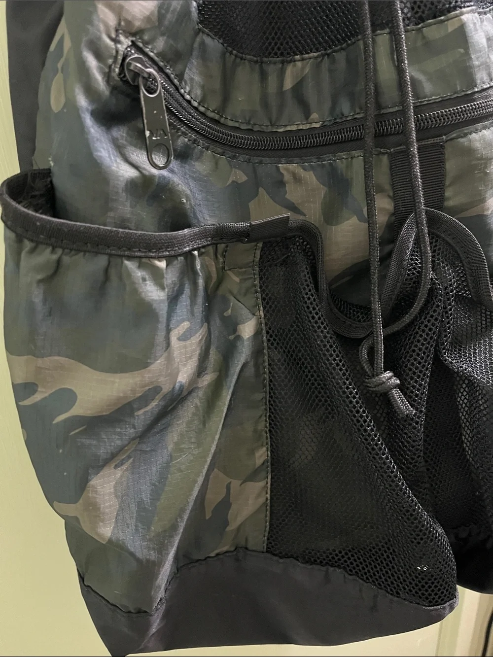 RVCA Camouflage Drawstring Backpack with Black Mesh Accents